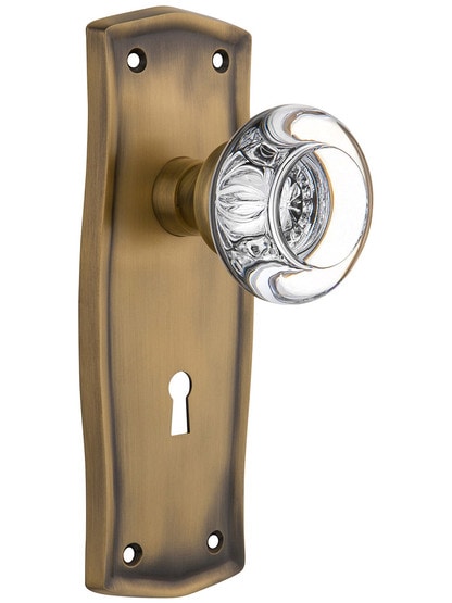 Prairie Plate with Round Clear Crystal Knob with Keyhole in Antique Brass.